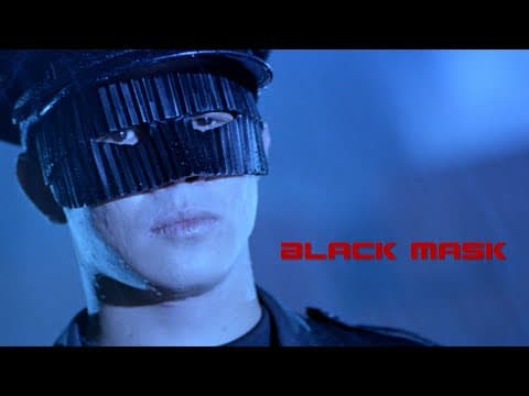 The Black Mask parachutes in
