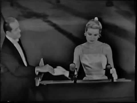 Walt Disney presented with an award at the 27th Academy Awards