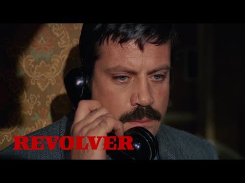 REVOLVER "We've just kidnapped your wife!" Clip