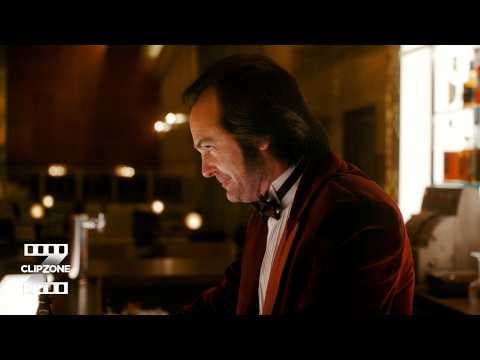 A Man Takes A Drink