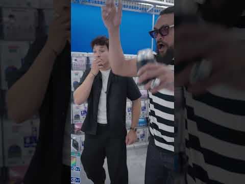 Jason Momoa vs. the claw machine.